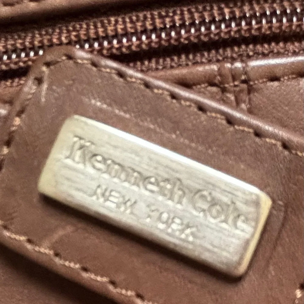 KENNETH COLE CHOCOLATE BROWN LEATHER CROSSBODY KNOT DEDIGN ON FRONT SNAP CLOSURE